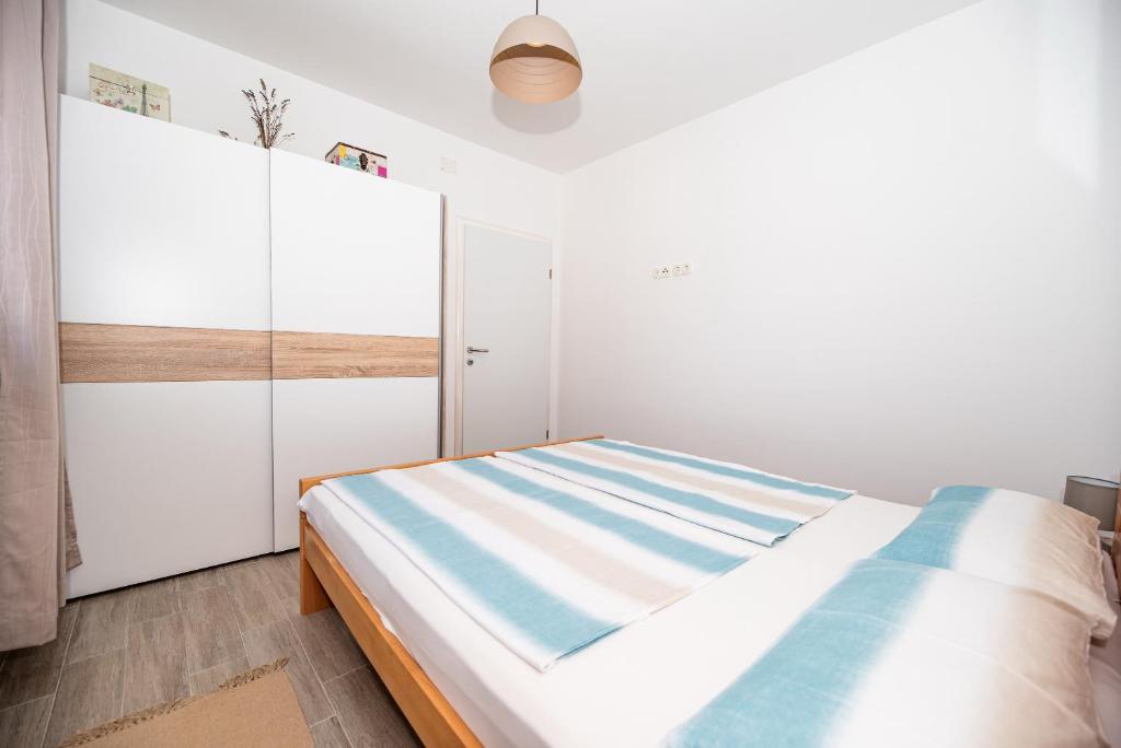 Posteľ alebo postele v izbe v ubytovaní Apartment Don Vito