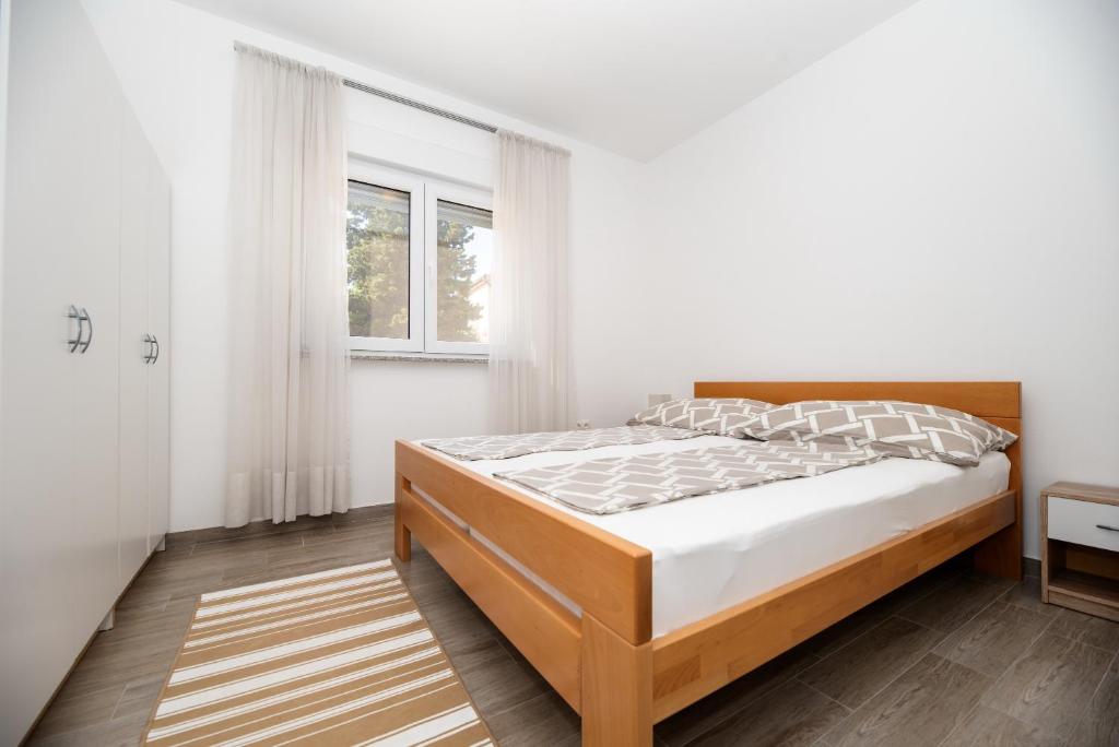 Posteľ alebo postele v izbe v ubytovaní Apartment Don Vito