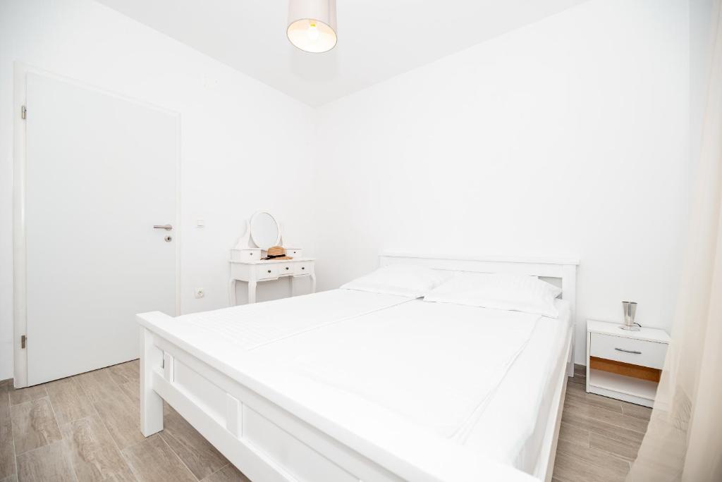 Posteľ alebo postele v izbe v ubytovaní Apartment Don Vito