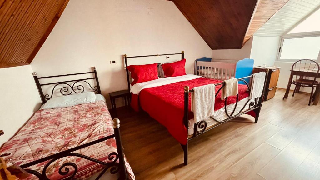 Postel nebo postele na pokoji v ubytování Hotel Drinos