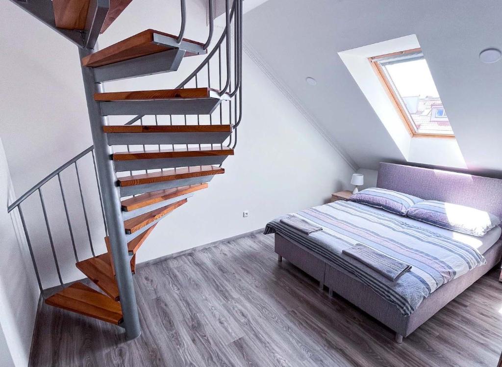Postel nebo postele na pokoji v ubytování Minihotel Vitex