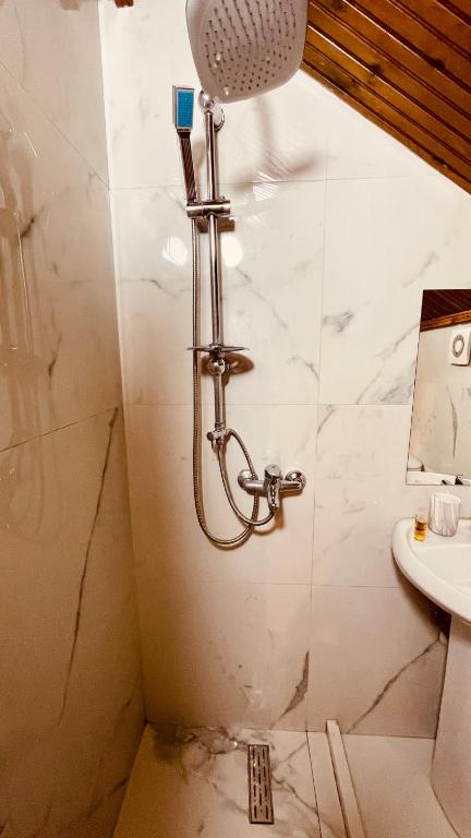 Koupelna v ubytování Hotel Drinos