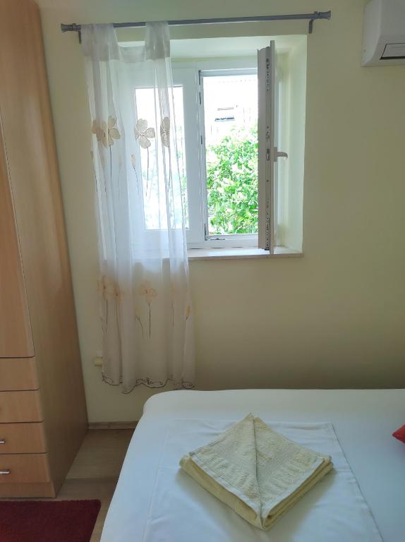 Posteľ alebo postele v izbe v ubytovaní Guesthouse Anna