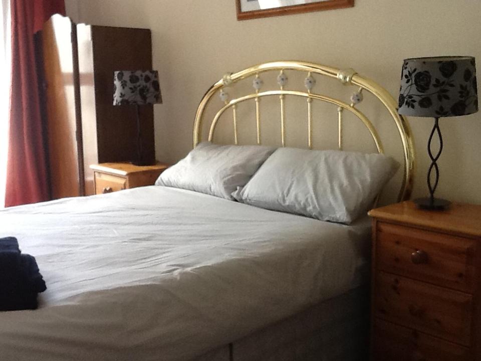 Postel nebo postele na pokoji v ubytování Noreen Seans