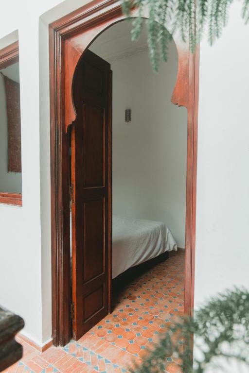 Postel nebo postele na pokoji v ubytování Noqta Space Coworking Coliving Space
