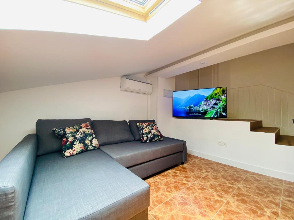 Χώρος καθιστικού στο APARTAMENTO TURISTICO ATICO LA TABERNA