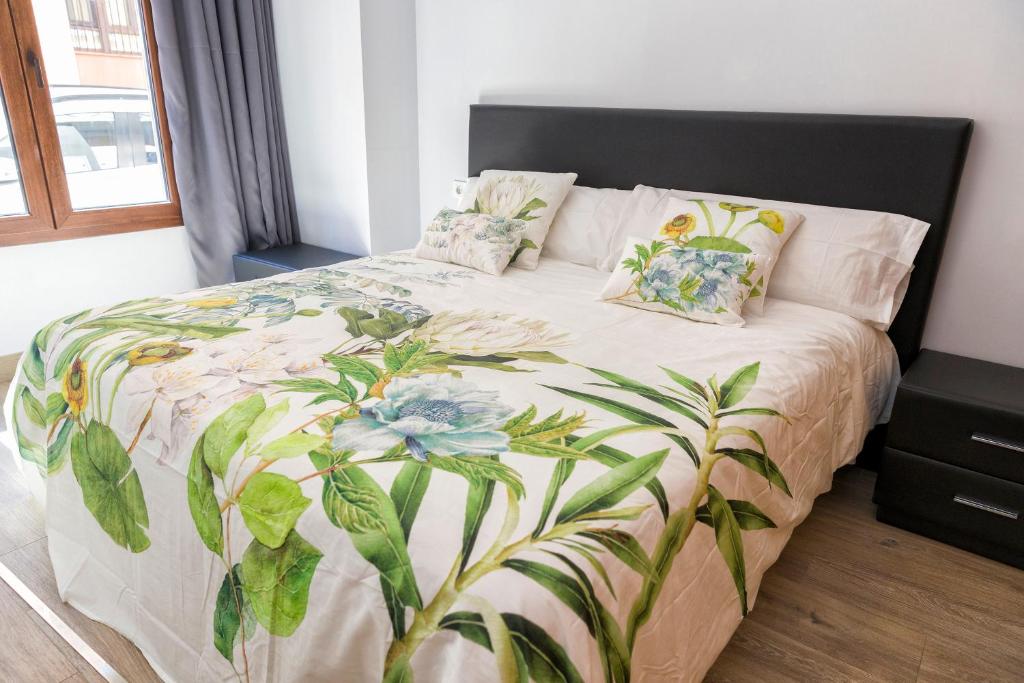 Posteľ alebo postele v izbe v ubytovaní APARTAMENTOS ONNIGHT