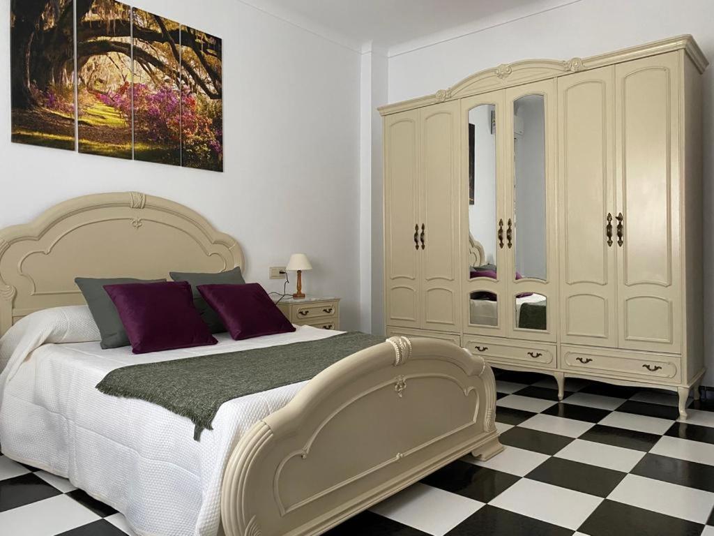 Een bed of bedden in een kamer bij Villa El Mirador