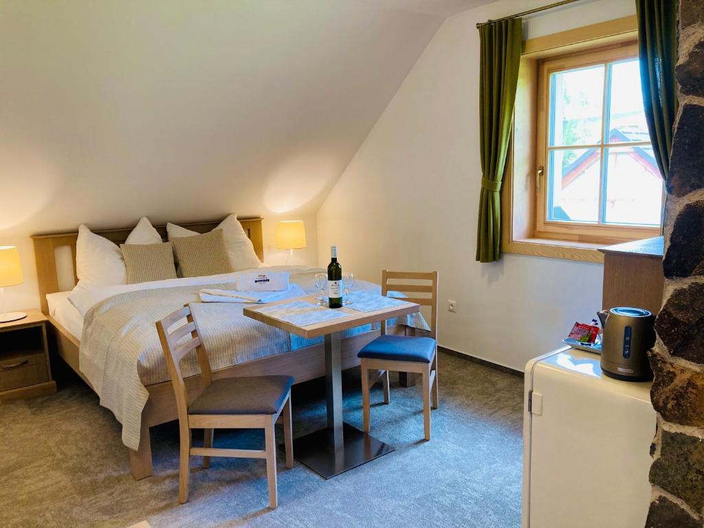 Postel nebo postele na pokoji v ubytování Apartmány Roháče