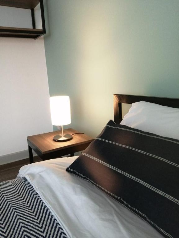 Postel nebo postele na pokoji v ubytování NEREO rooms