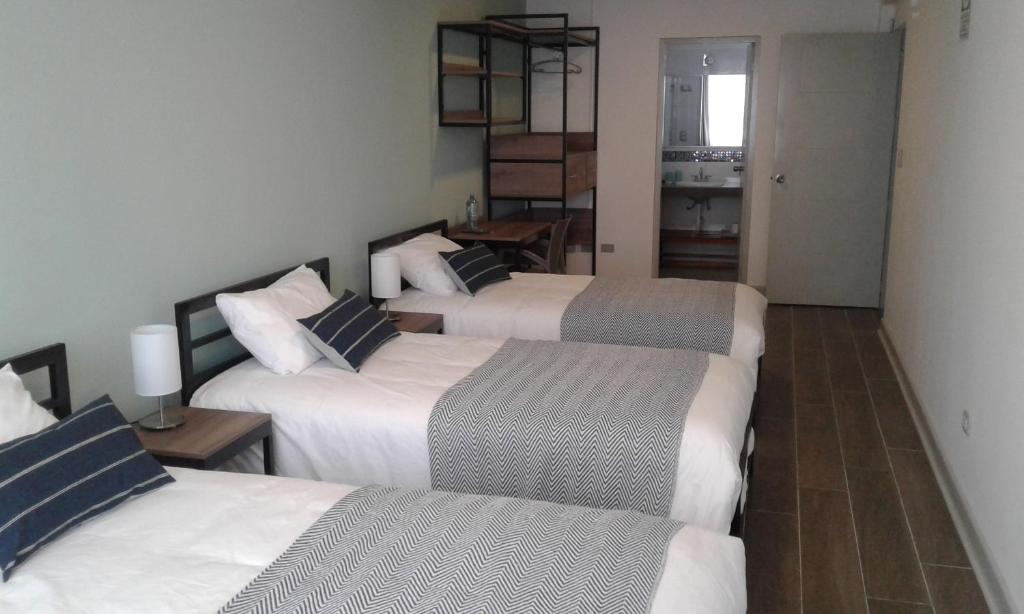 Postel nebo postele na pokoji v ubytování NEREO rooms
