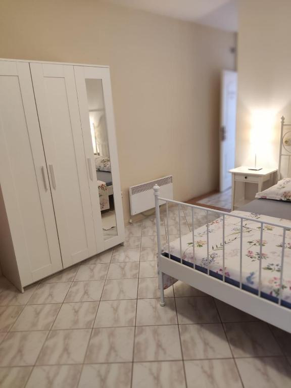 Posteľ alebo postele v izbe v ubytovaní Apartment Dalma