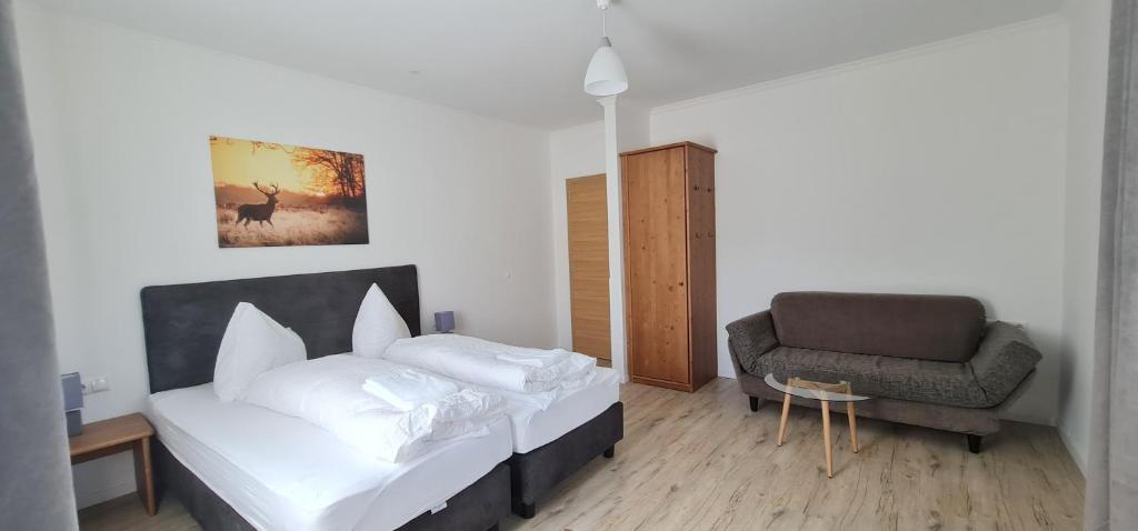 Postel nebo postele na pokoji v ubytování Apartment Traube - Stelvio