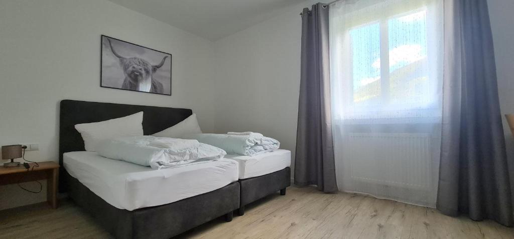 Postel nebo postele na pokoji v ubytování Apartment Traube - Stelvio