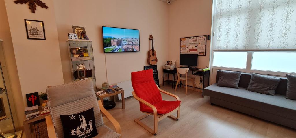 TV a/nebo společenská místnost v ubytování Albergue SIXTOs no Caminho