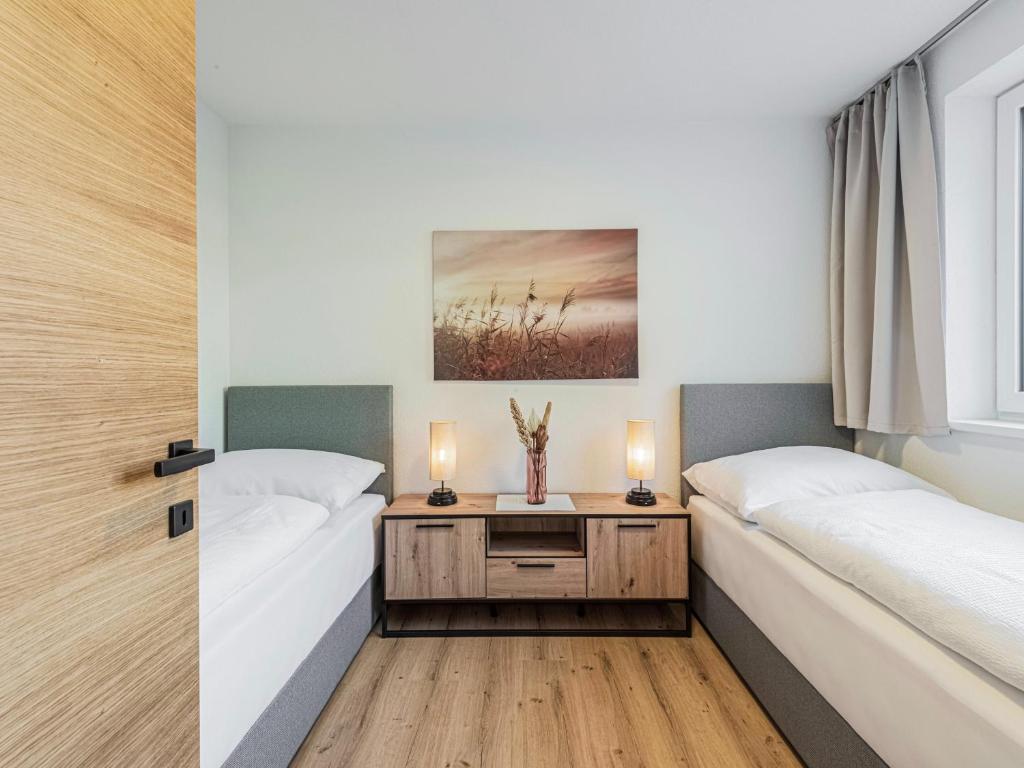 Postel nebo postele na pokoji v ubytování Apartment Alpenherz