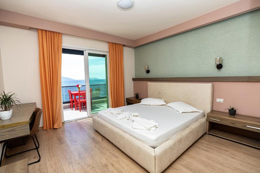 Postel nebo postele na pokoji v ubytování Hotel Picasso