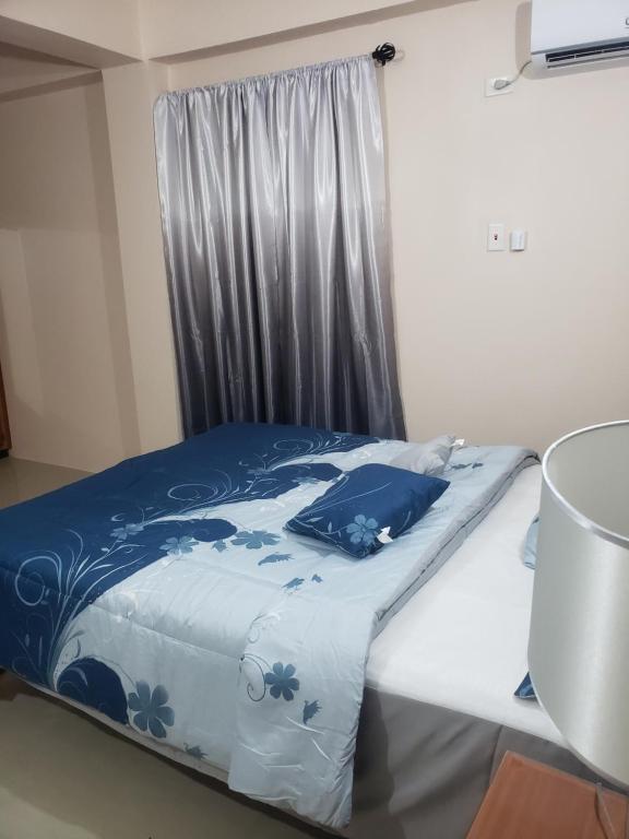 Postel nebo postele na pokoji v ubytování Skyland Oasis