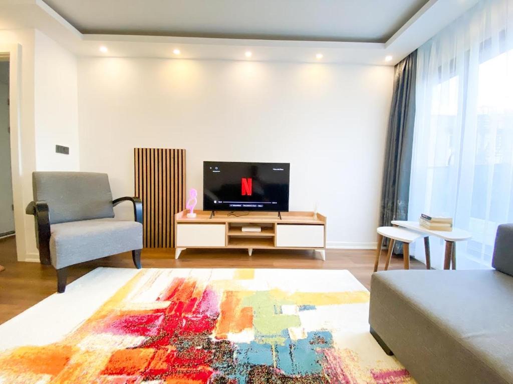 TV a/nebo společenská místnost v ubytování Luxury One Bedroom Apartment near Galataport 6