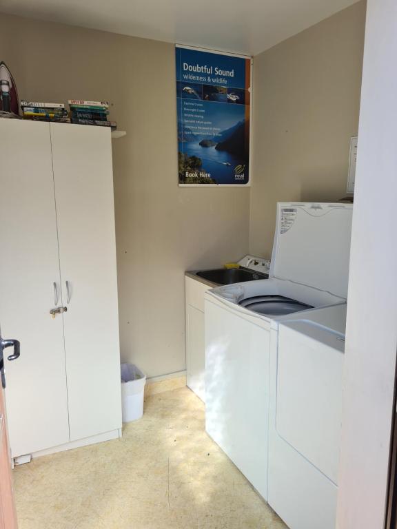 Kuchyň nebo kuchyňský kout v ubytování Arran Motel