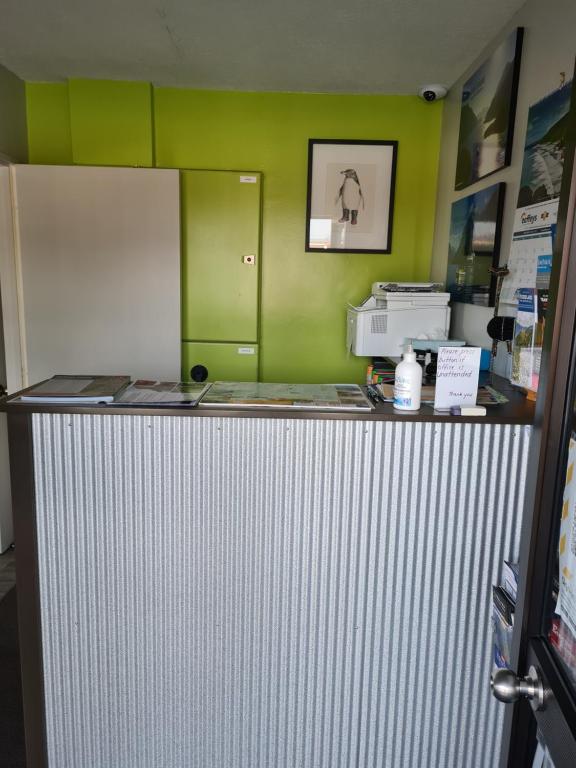 Kuchyň nebo kuchyňský kout v ubytování Arran Motel