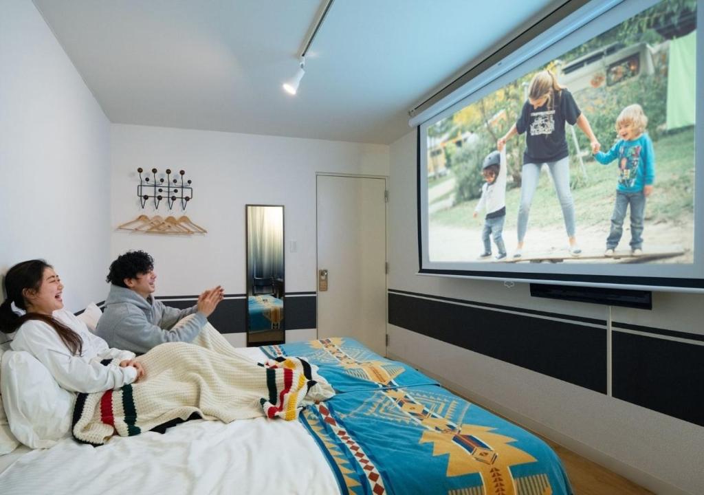 TV a/nebo společenská místnost v ubytování Hotel Graphy Nezu