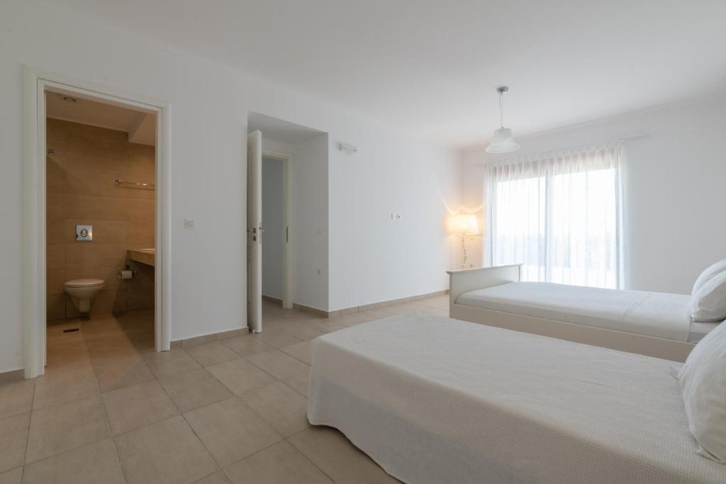 Postel nebo postele na pokoji v ubytování Villa Milena with private pool, Vlicha beach Lindos