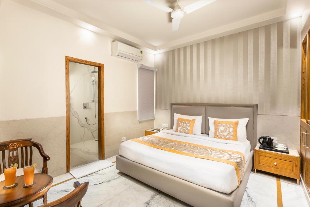 Postel nebo postele na pokoji v ubytování Hotel Star By Star Group- Near Delhi Airport