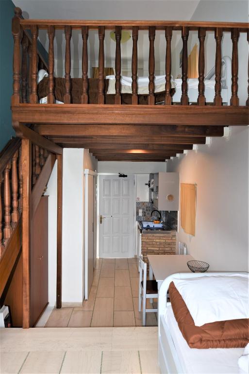 Kuchyň nebo kuchyňský kout v ubytování Meraki Apartments and Studios