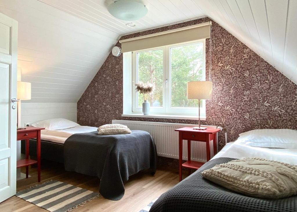 Postel nebo postele na pokoji v ubytování SÖRWESPA Nature Resort