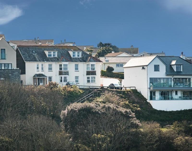 a group of houses on top of a hill at Pinewood 14 in Polzeath