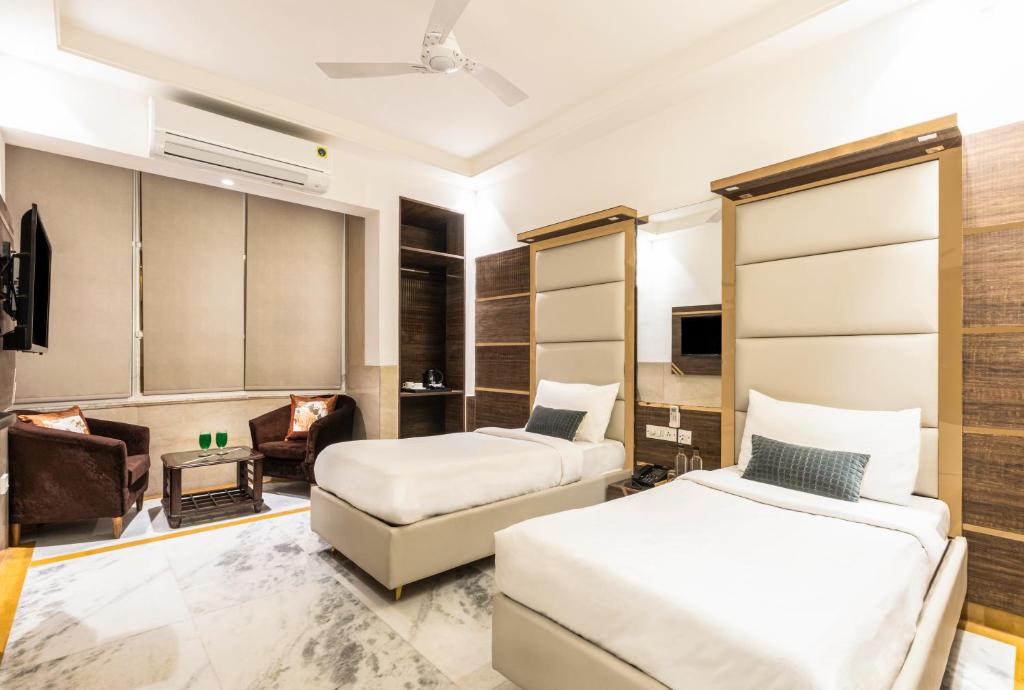 Postel nebo postele na pokoji v ubytování Hotel Star By Star Group- Near Delhi Airport