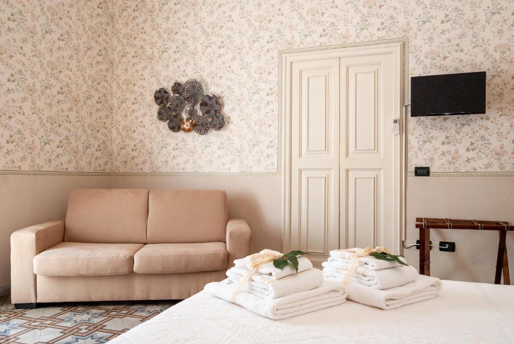 Televízia a/alebo spoločenská miestnosť v ubytovaní B&B Risveglio col Rosone