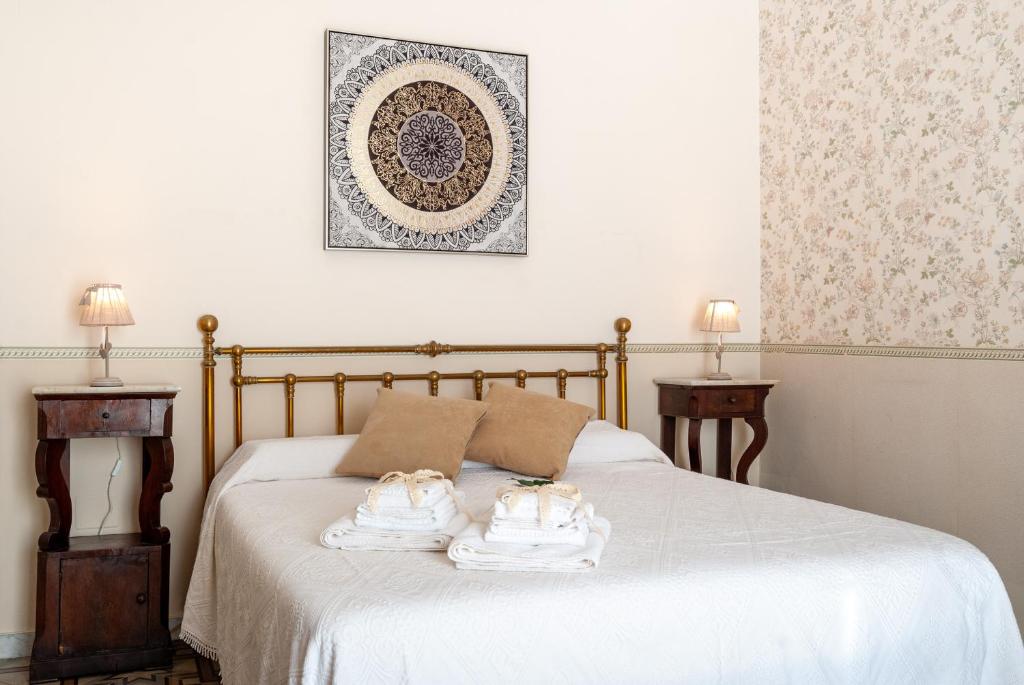 Posteľ alebo postele v izbe v ubytovaní B&B Risveglio col Rosone