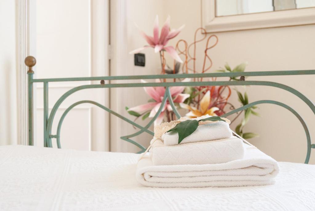 Posteľ alebo postele v izbe v ubytovaní B&B Risveglio col Rosone