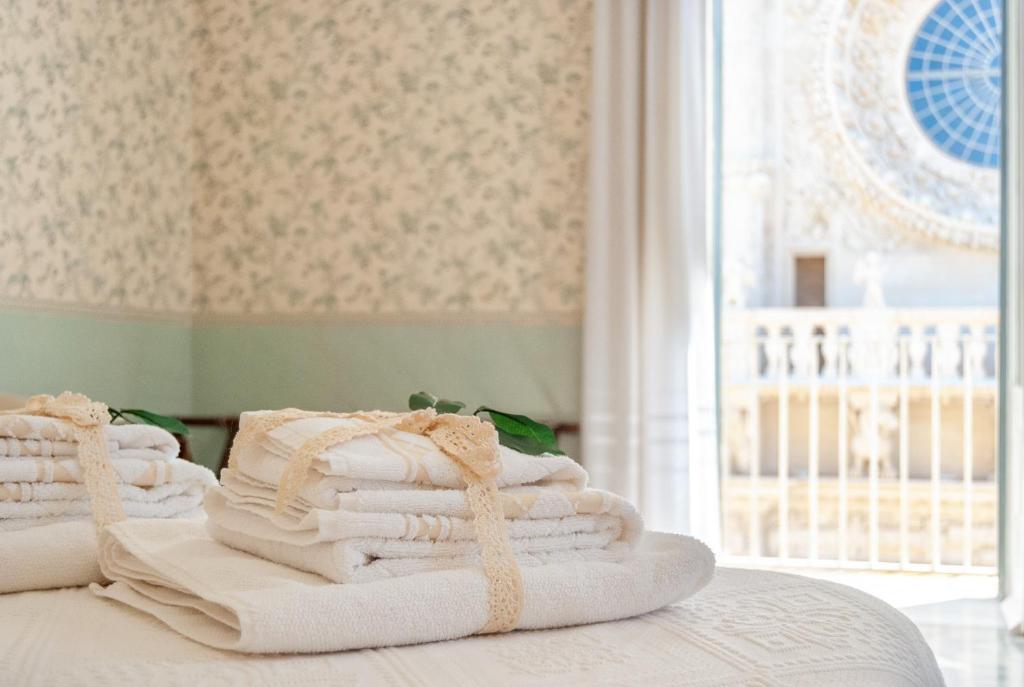 Posteľ alebo postele v izbe v ubytovaní B&B Risveglio col Rosone