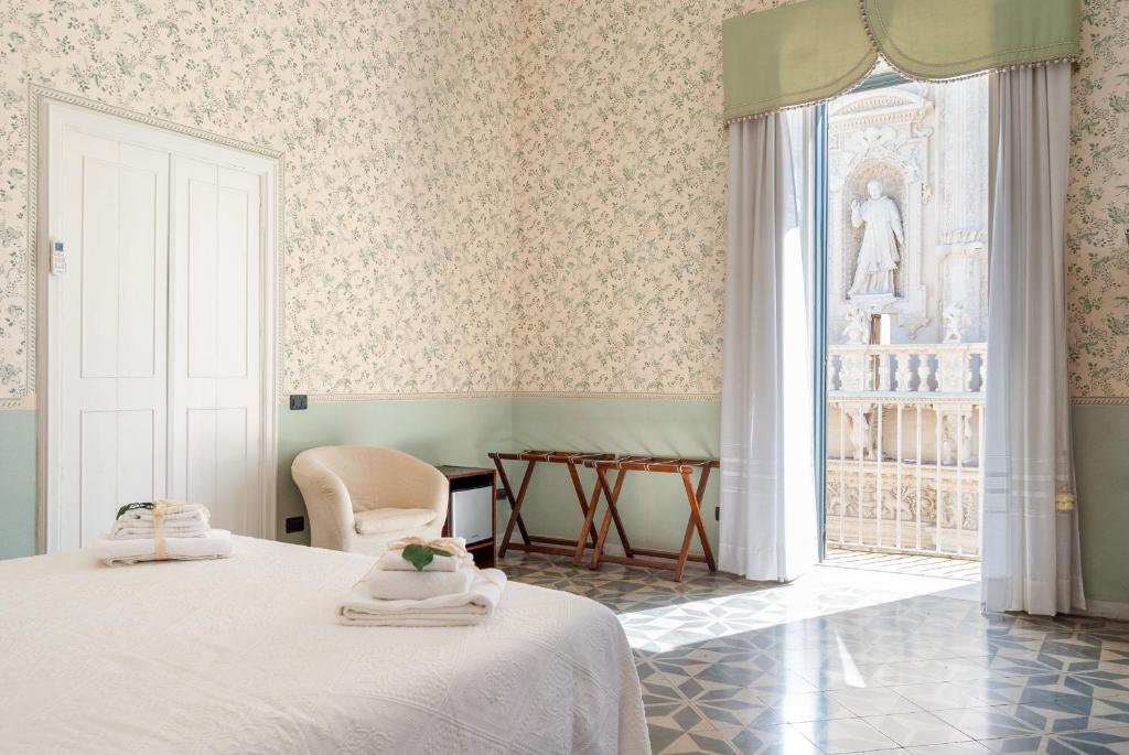 Posteľ alebo postele v izbe v ubytovaní B&B Risveglio col Rosone