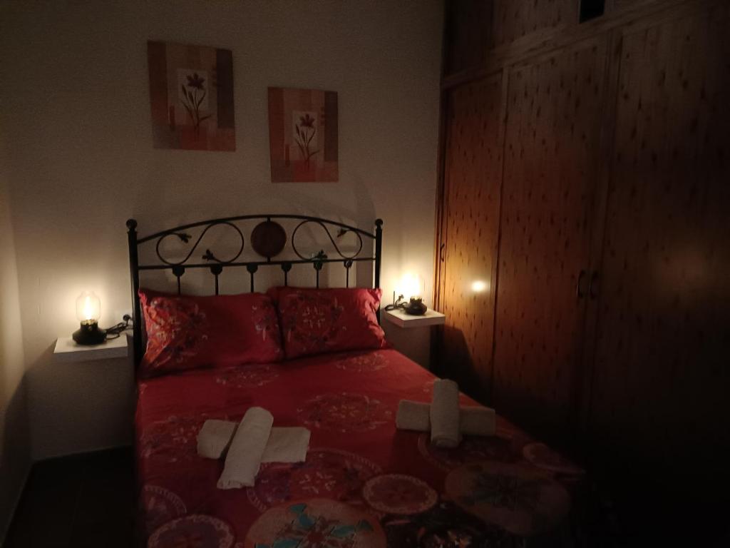 A bed or beds in a room at Casa AMALFi, Coqueta casa Centro histórico de Vejer