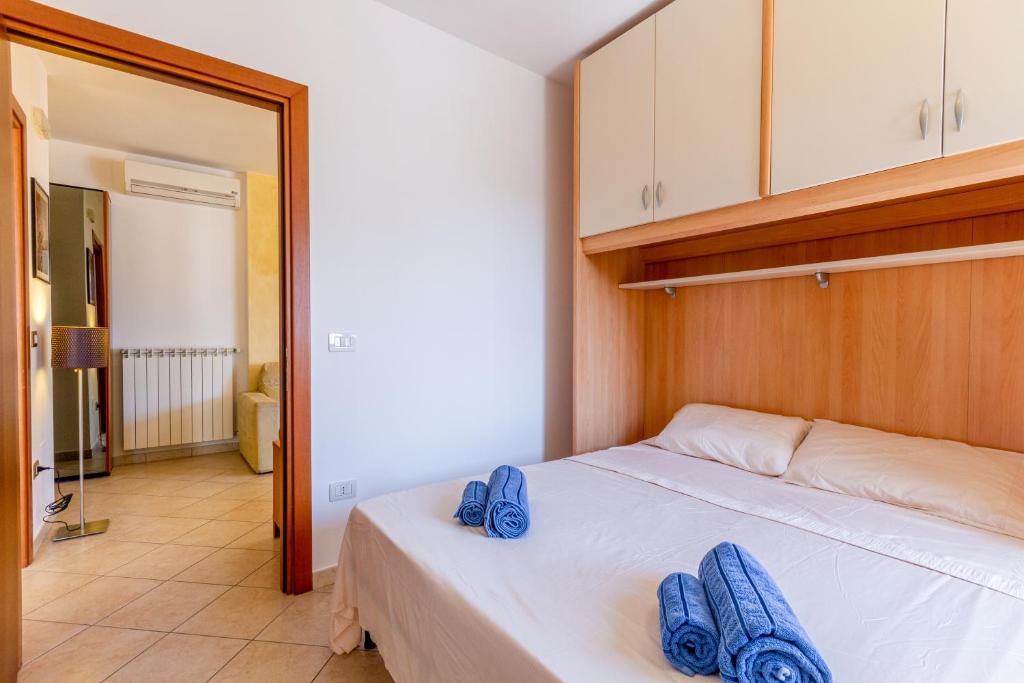 Łóżko lub łóżka w pokoju w obiekcie Roomy Apartment with Terrace & Parking