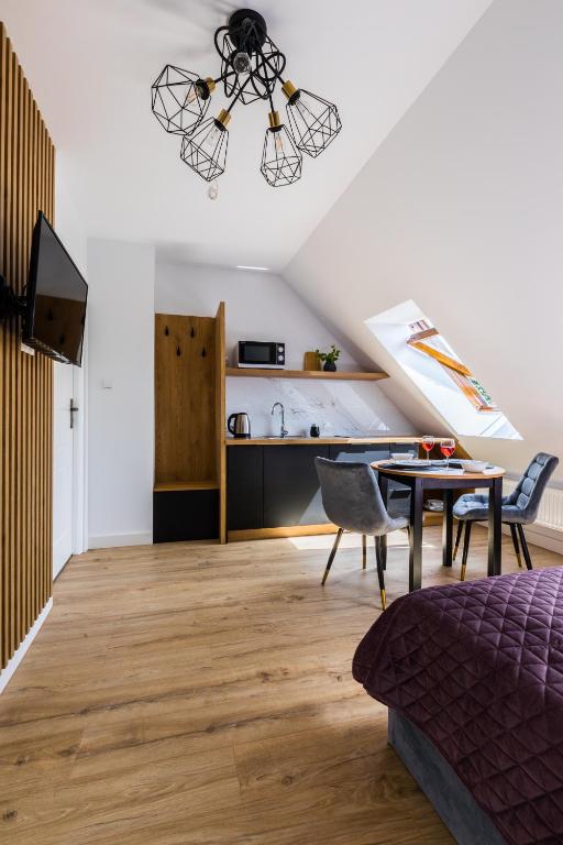 Kuchyňa alebo kuchynka v ubytovaní Apartamenty Krupówki 48B