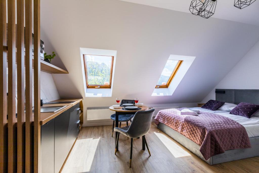 Posteľ alebo postele v izbe v ubytovaní Apartamenty Krupówki 48B