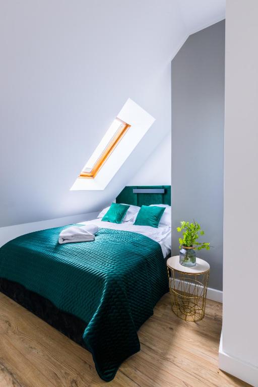 Posteľ alebo postele v izbe v ubytovaní Apartamenty Krupówki 48B