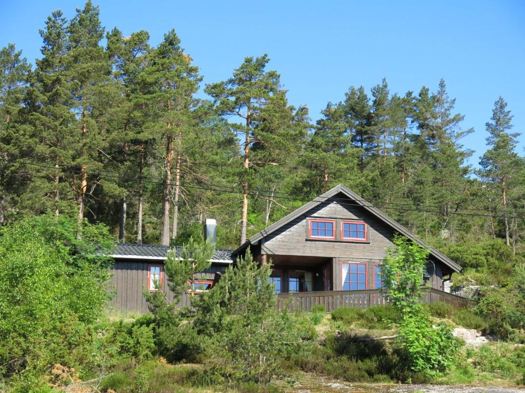 a house in the middle of a forest at Chalet Koven - SOW114 by Interhome in Øyuvstad