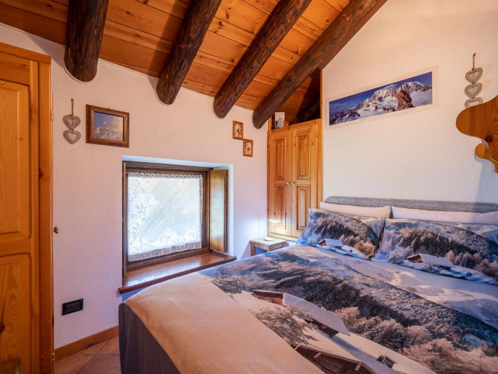 A bed or beds in a room at Apartment Remondet 20 by Interhome