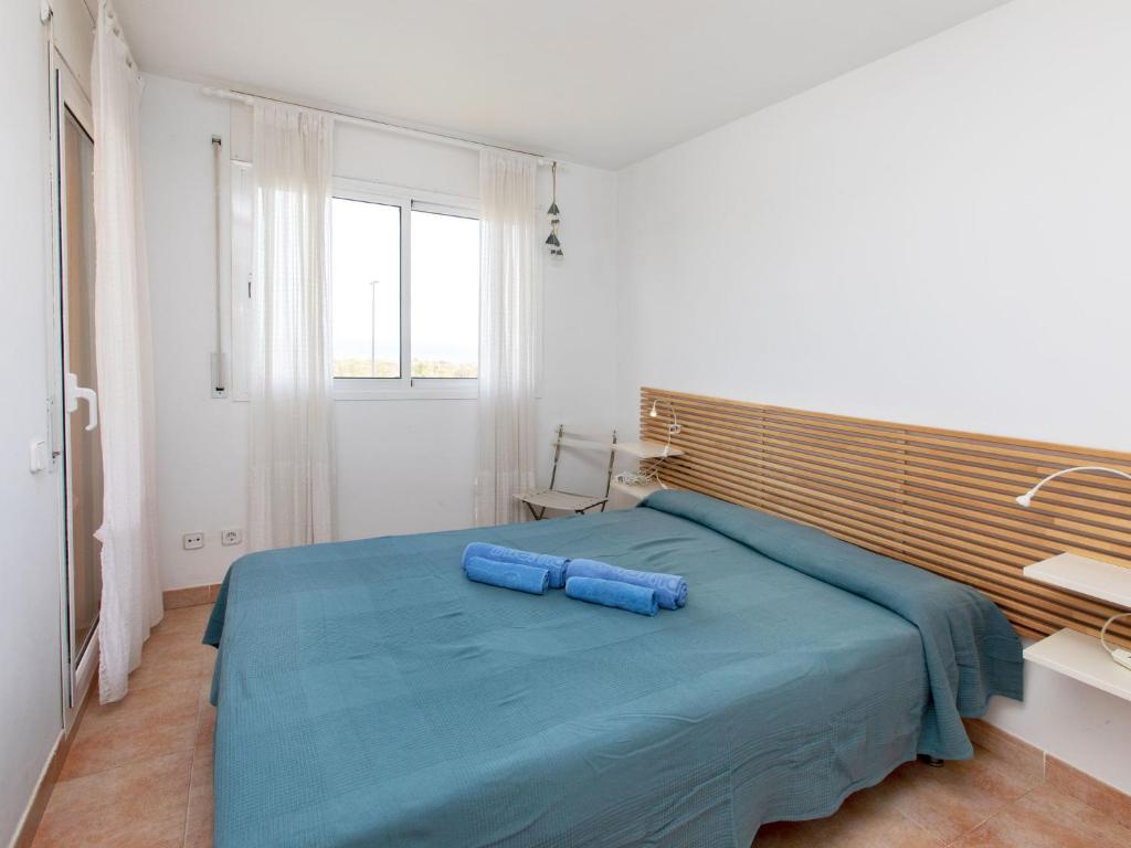 Postel nebo postele na pokoji v ubytování Apartment Port Pals B II by Interhome
