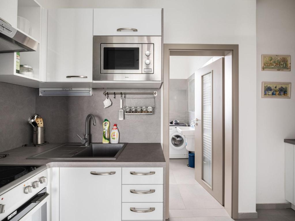 Kuchyň nebo kuchyňský kout v ubytování Apartment Lány by Interhome
