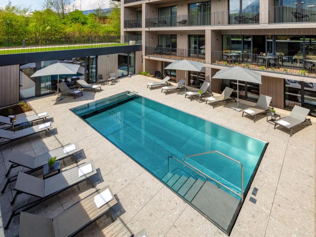 an overhead view of a swimming pool on a building at Apartment Emma Deluxe Aparthotel-2 by Interhome in Fürth