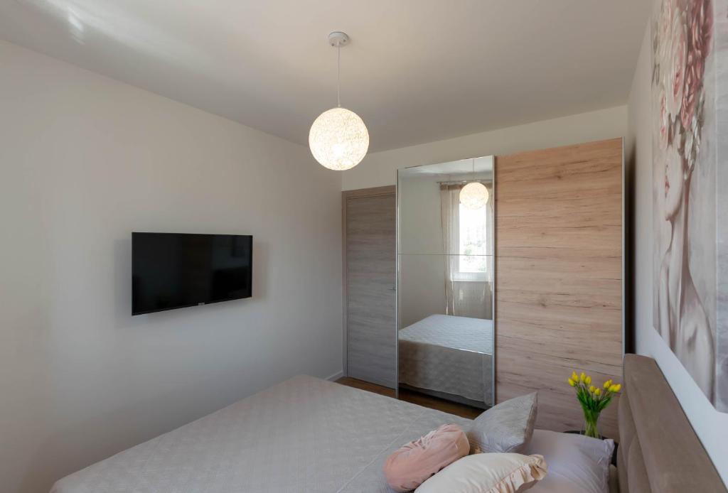 Posteľ alebo postele v izbe v ubytovaní Empress apartment