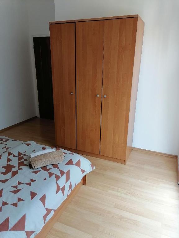Postel nebo postele na pokoji v ubytování Apartments Zdenka