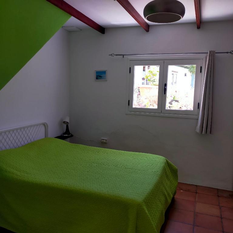 Postel nebo postele na pokoji v ubytování Vistas del Sur